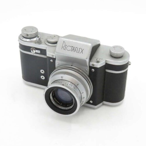 A vintage Rectaflex camera with a black and silver body and a large lens.