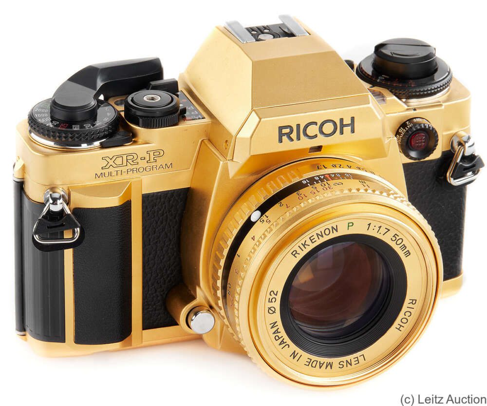 Ricoh-Ricoh-XR-P-Gold Gold-plated Ricoh XR-P film camera with Rikenon P 1:1.7 50mm lens.