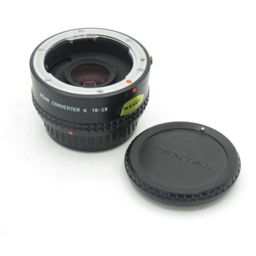 Pentax rear converter K T6-2X with lens cap.