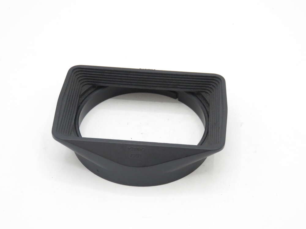 IMG_0349 Rectangular black rubber lens hood for a camera.