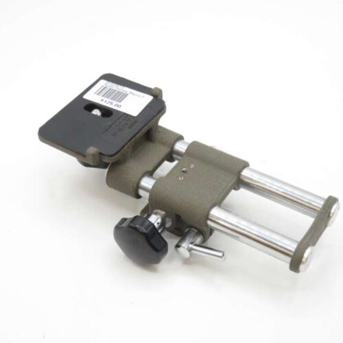 Microscope stage micrometer with angular adjustment, metal and plastic components.