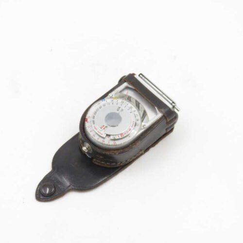 Vintage light meter in a brown leather case.