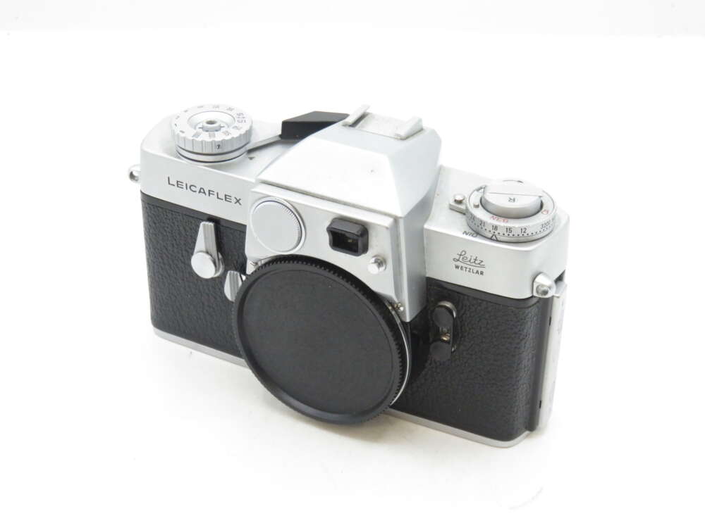 IMG_0890 Retro-style LeicaFlex film camera with a black leather grip and silver metal body.