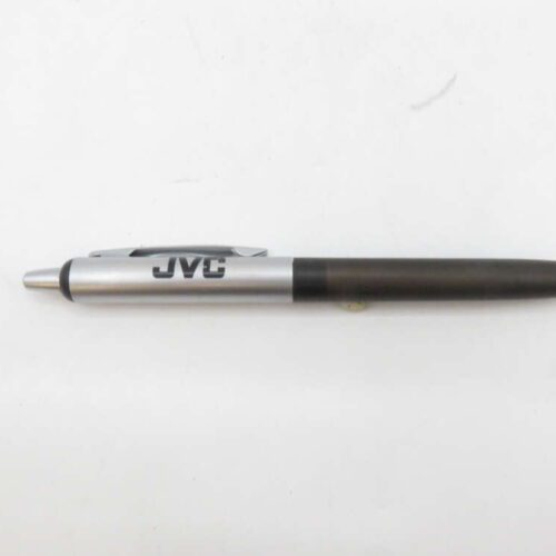 Black and silver ballpoint pen with "JVC" printed on the clip part.