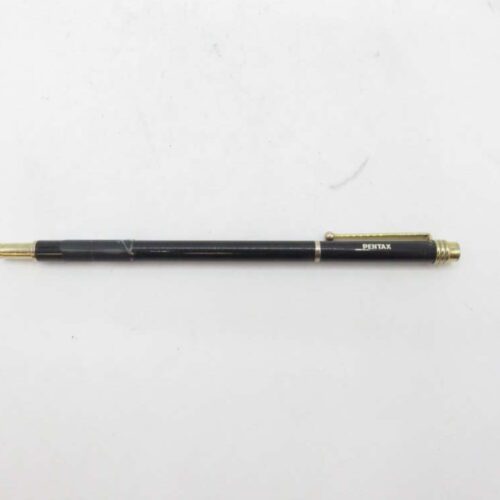 Black Pentax pen with gold clip and accents.