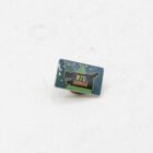Rectangular pin with "H70 HITACHI" text, featuring a green and black design on a blue background.