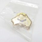 Gold-coloured lapel pin in the shape of Australia, marked with "Photomarketing Association Australia," inside a plastic bag.