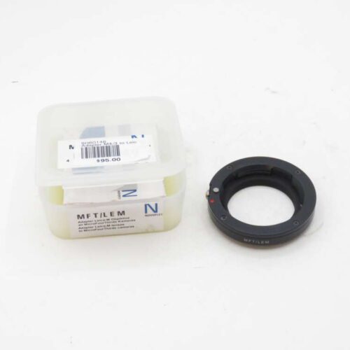 Lens adapter with its packaging labelled "MFT/LEM" and priced at $95.00, used to connect Leica M lenses to Micro Four Thirds cameras.