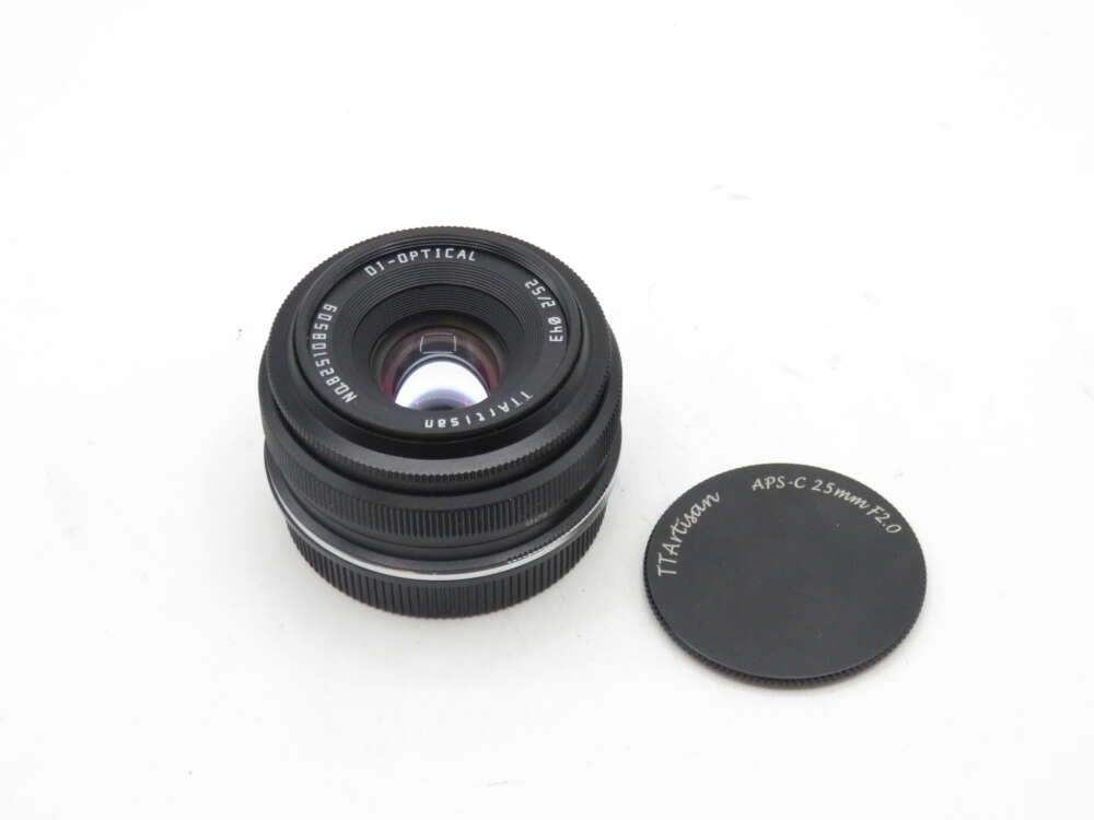 IMG_1489 TTArtisan APS-C 25mm f/2.0 camera lens with lens cap.