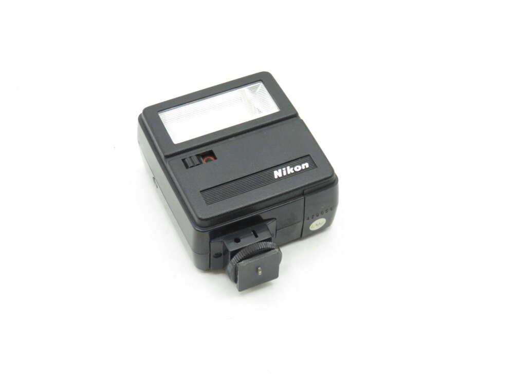 IMG_1972 Nikon camera flash unit on a white background.