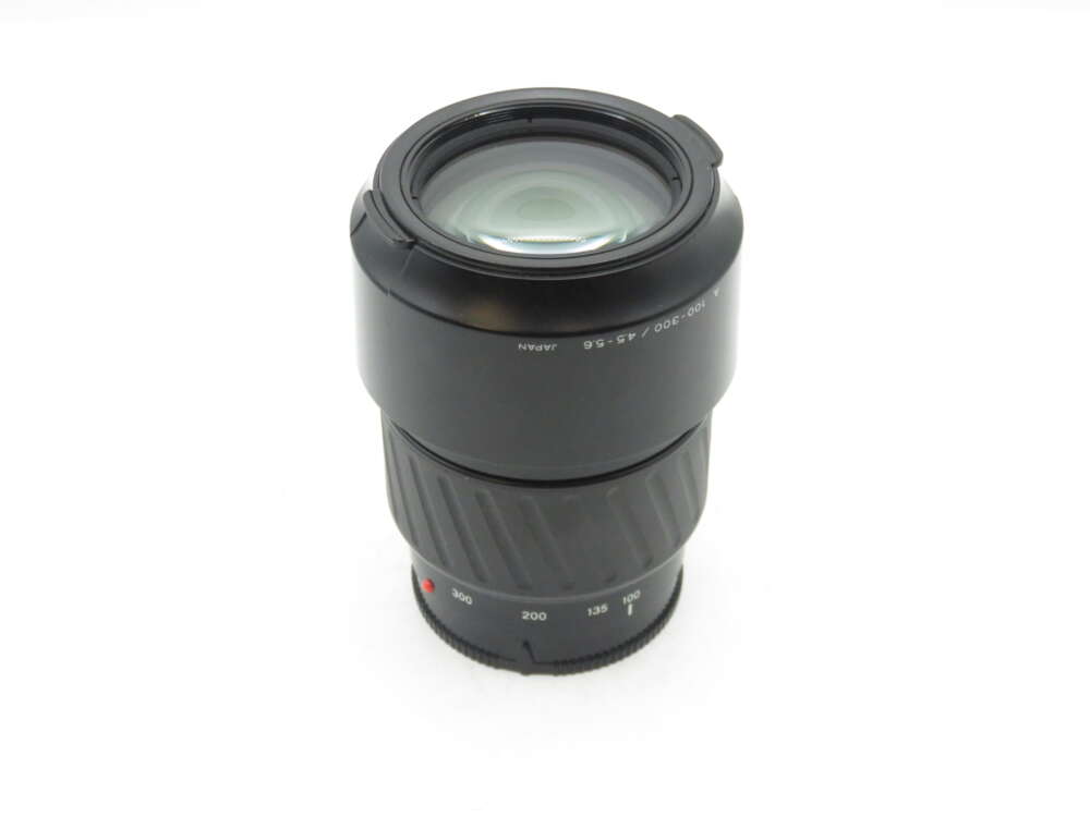 IMG_2067 a black camera lens with a white background