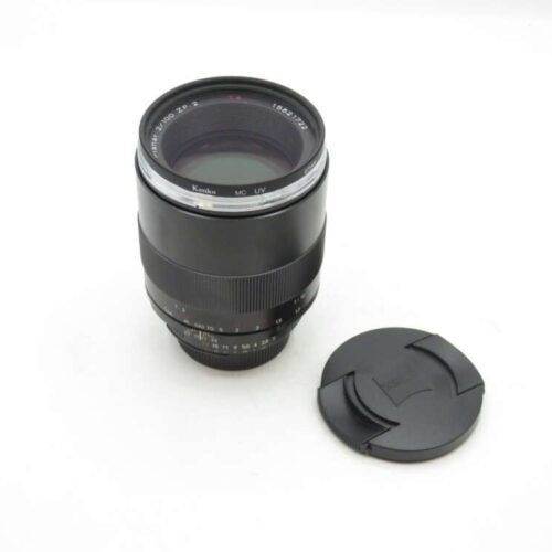 a black camera lens with a black cap
