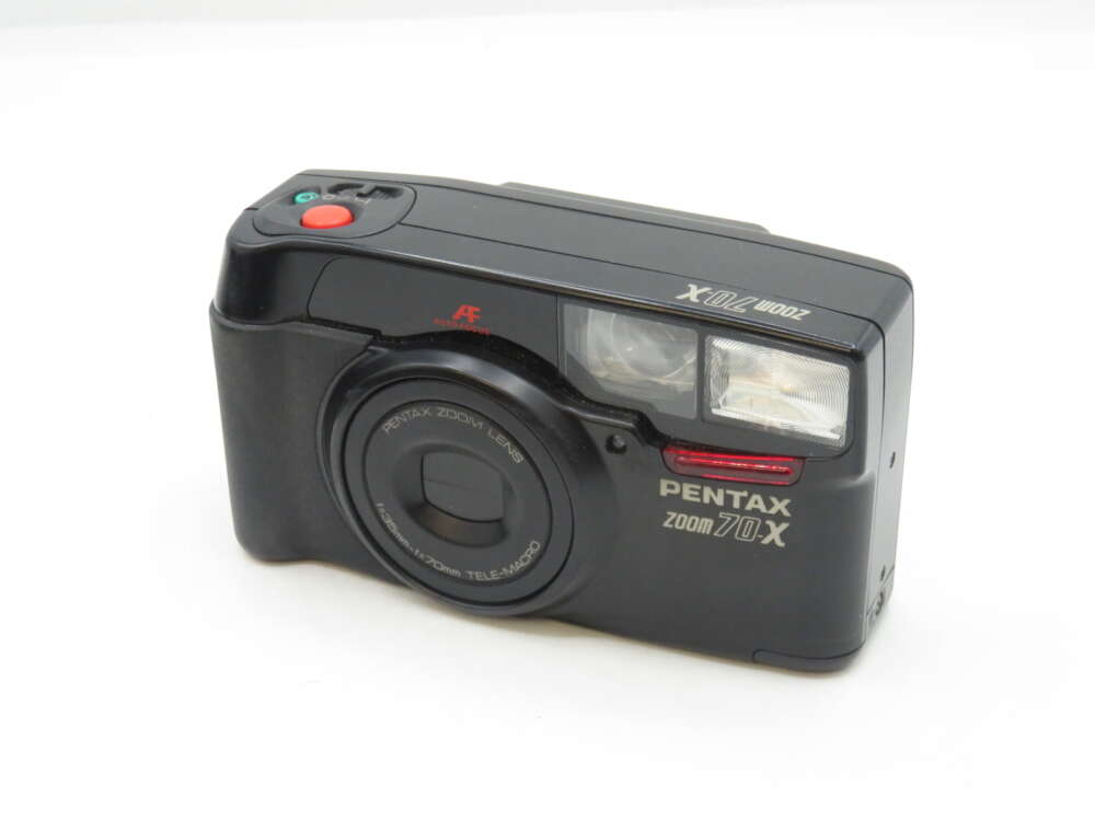 IMG_2222 Black Pentax Zoom 70-X 35mm film camera with flash and zoom lens.