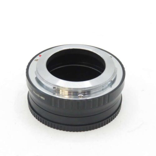 Camera lens adapter on a white background.