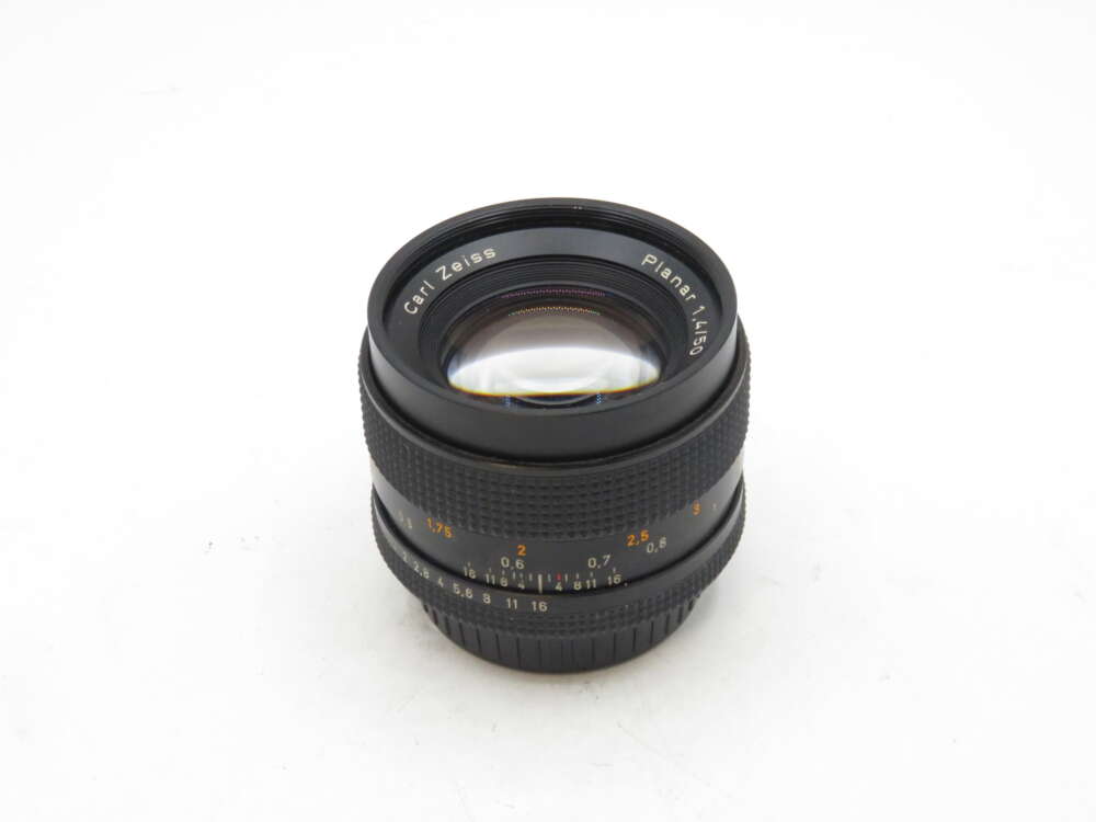 IMG_2505 Camera lens with "Carl Zeiss Planar 1.4/50" text.