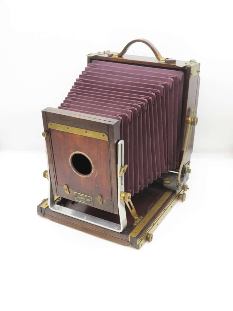 IMG_2534 Vintage large format camera with bellows and wooden frame.