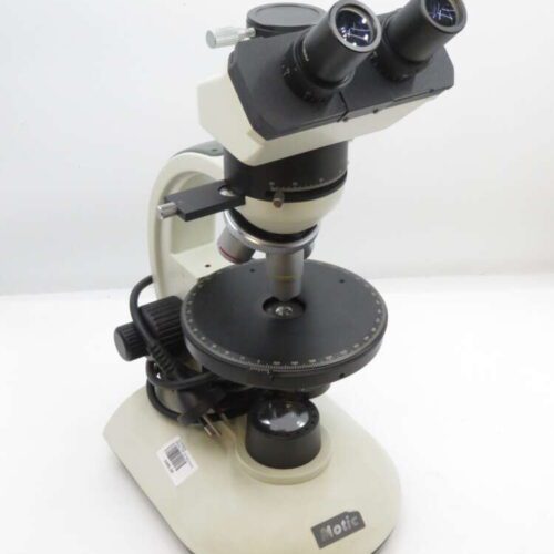 A laboratory microscope with a dual eyepiece and a rotating stage.