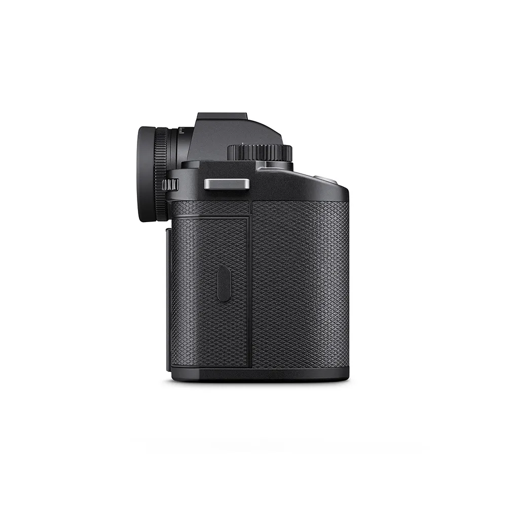 Side view of a black digital camera.