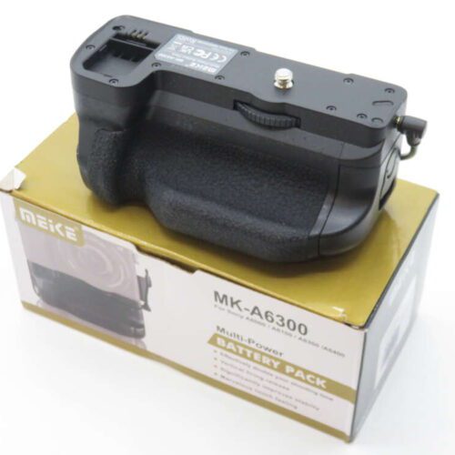 Alt text: Meike MK-A6300 battery pack on its packaging box for Sony cameras.