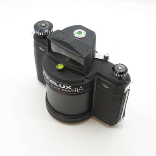 A vintage Widelux swing-lens panoramic camera with two cylindrical film holders and a central mechanism for taking wide-angle photographs.