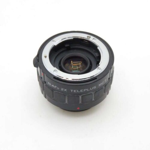 A black N-AFD 2x Teleplus MC7 teleconverter lens on a white background.