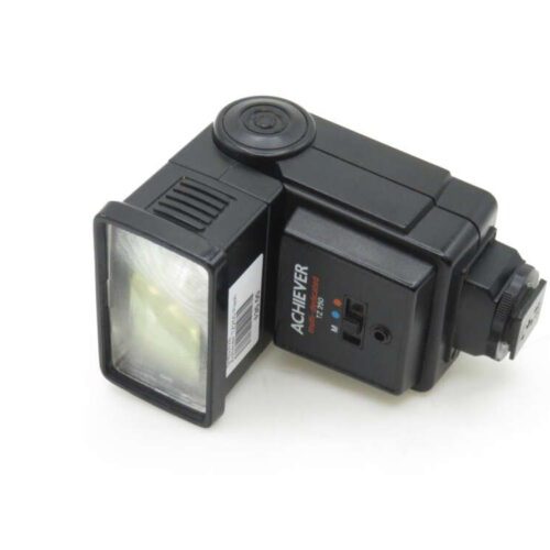A black Achiever brand camera flash unit model TZ250 lying on its side, featuring a rectangular flash head and controls on the body.