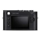 Rear view of a black digital camera displaying a large LCD screen in the center, with control buttons labeled 'PLAY', 'FN', and 'MENU' on the left, and a multi-directional navigation pad on the right. The camera features a textured grip, and is labeled 'Made in Germany'.