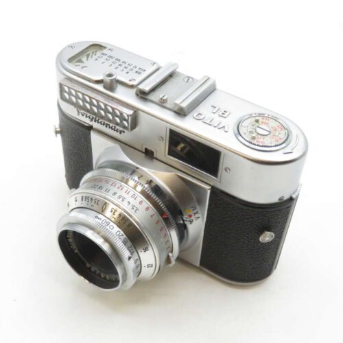 A vintage Voigtländer Vito BL 35mm film camera with a silver metal body and black leather grip, featuring a prominent lens and a top-mounted light meter.