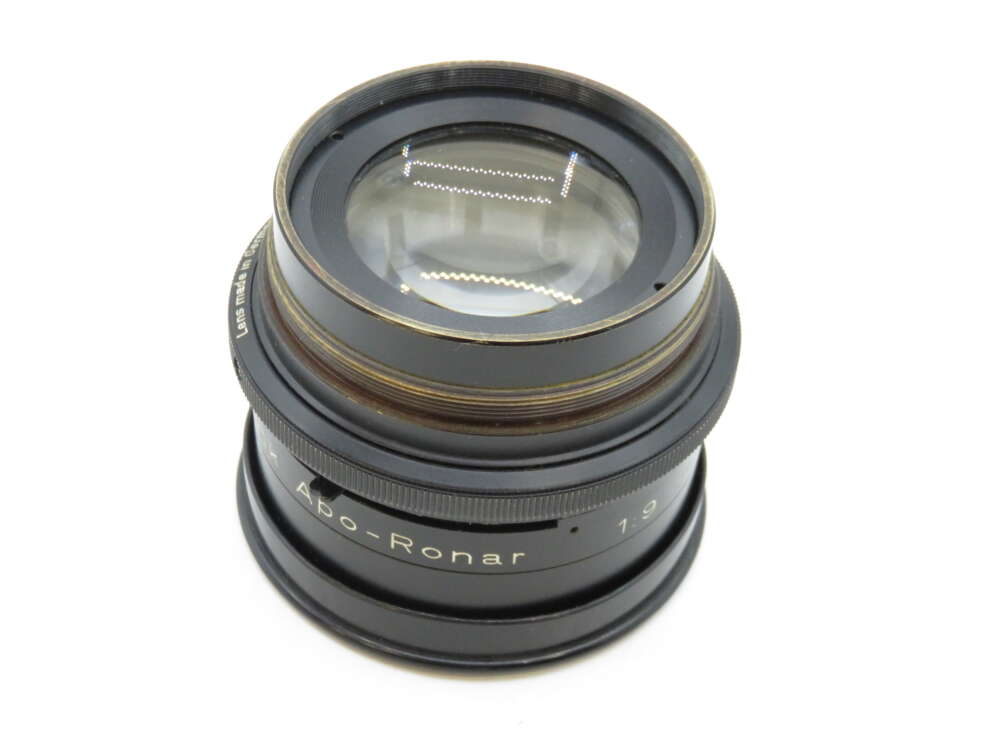 IMG_2229 Close-up of a Rodenstock Apo-Ronar 1:9 camera lens with black casing and visible glass elements.