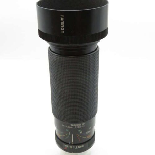 A vintage Tamron SP 60-300mm camera lens with a textured focus ring and labelled markings.