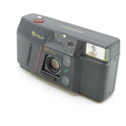 A vintage Fuji camera with a rectangular design, labelled "Fujix" and featuring a lens and built-in flash.