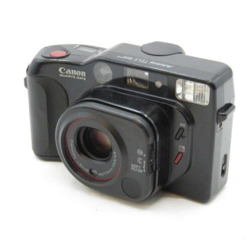 A black Canon camera with a large lens and built-in flash, labelled as "Quartet Date" and "Tele Super".