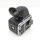 Vintage medium format camera with a waist-level viewfinder and a black and silver body.