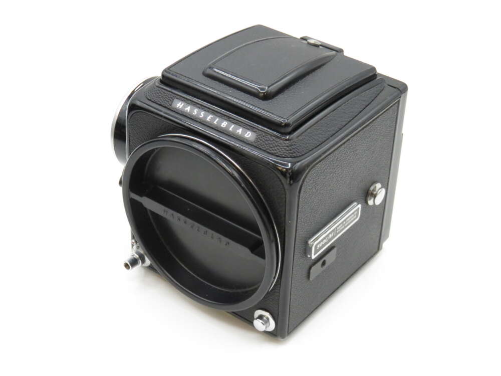IMG_3499 Black Hasselblad camera body with textured surface and the lens mount visible.