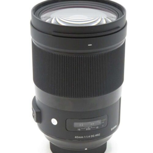 A black Sigma 40mm f/1.4 DG HSM Art lens with a focus range scale on its side.