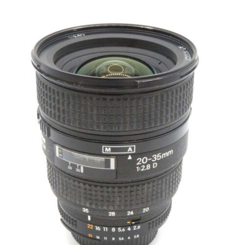 Camera lens with "20-35mm 1:2.8 D" markings, featuring zoom and focus rings, against a white background.