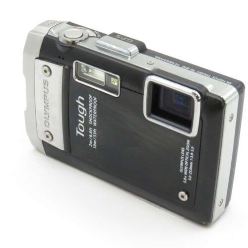 A black Olympus Tough digital camera with rugged design and visible lens on a white background.
