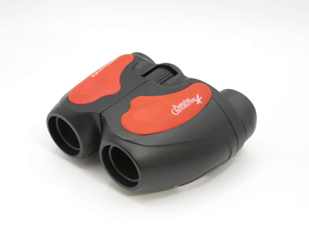 IMG_3916 Black and red binoculars with "Australian Geographic" logo on the top.