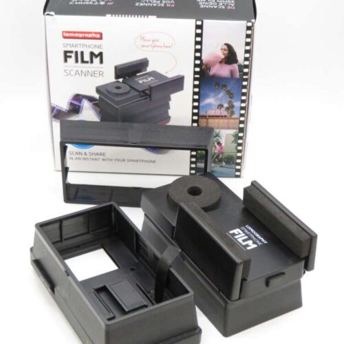 A smartphone film scanner with its packaging, showing the device for digitising film using a phone camera.