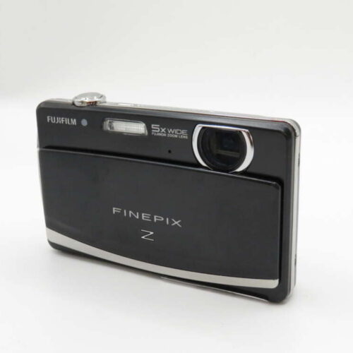 Black Fujifilm FinePix Z digital camera with a 5x wide zoom lens against a plain background.