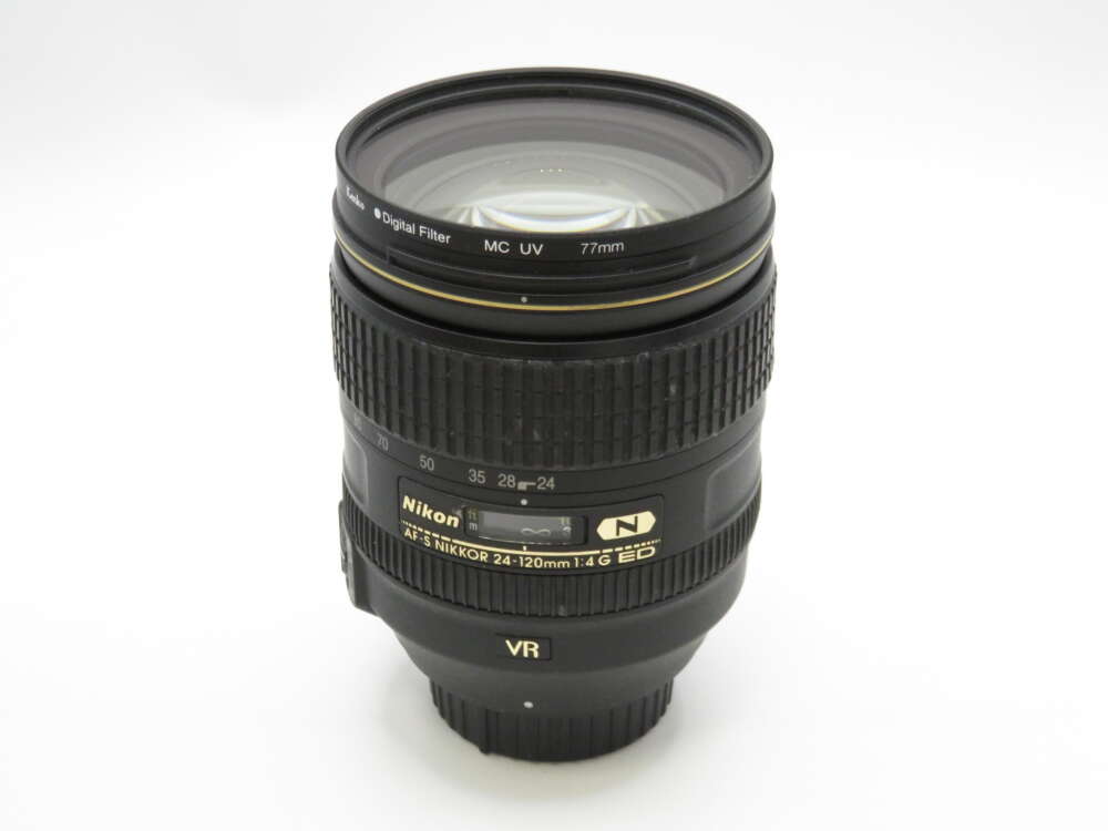 IMG_4142 A Nikon AF-S NIKKOR 24-120mm f/4G ED VR lens with visible focus and zoom rings.